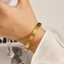 Stainless steel 18K gold plated four-leaf clover embossed closed bracelet: Simplicity and symbolic meaning thumbnail 3
