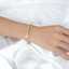 Handgefertigte Eleganz: Ein luxuriöses dreiteiliges Armbandset thumbnail 3