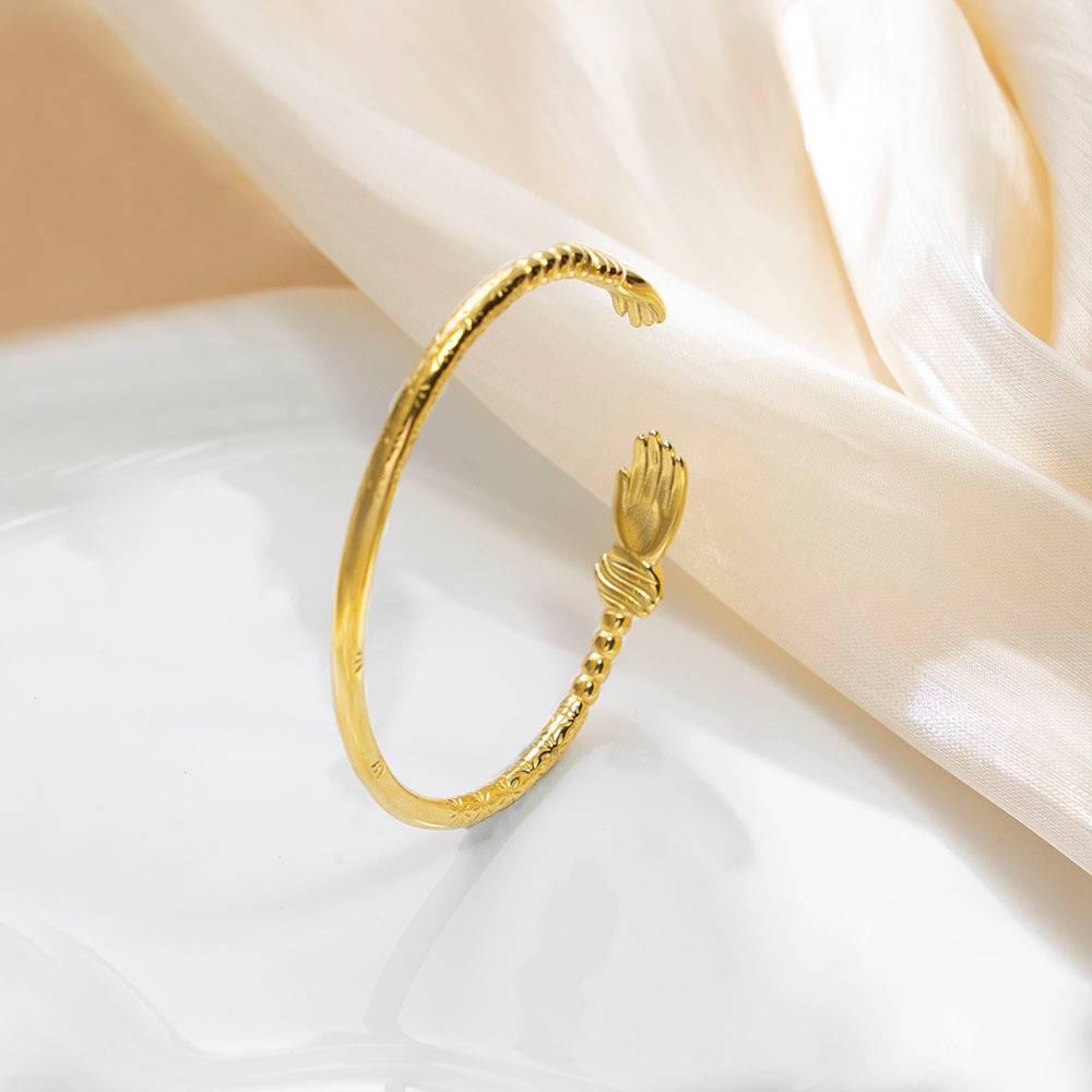 Explore the 18K Gold-Plated Stainless Steel Hand-Shaped Bracelet
