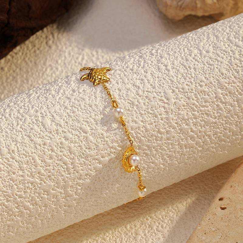 Gold Stainless Steel Bracelet with Pearl Ocean Charms by Lonceen